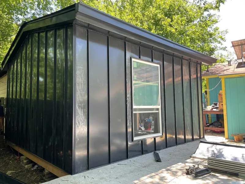 Black standing seam metal wall panels for Roof Inspection in East Lansing