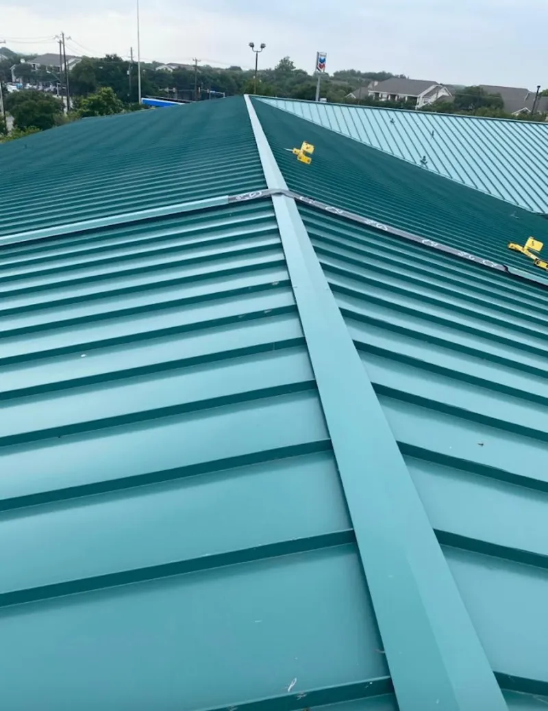 Green commercial metal roof ridge and valley for Metal Roof Repair in East Lansing