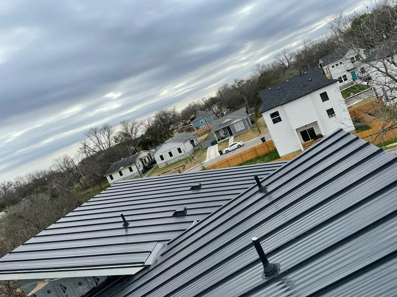 Standing seam metal roof panels with vents for Skylight Repair in East Lansing